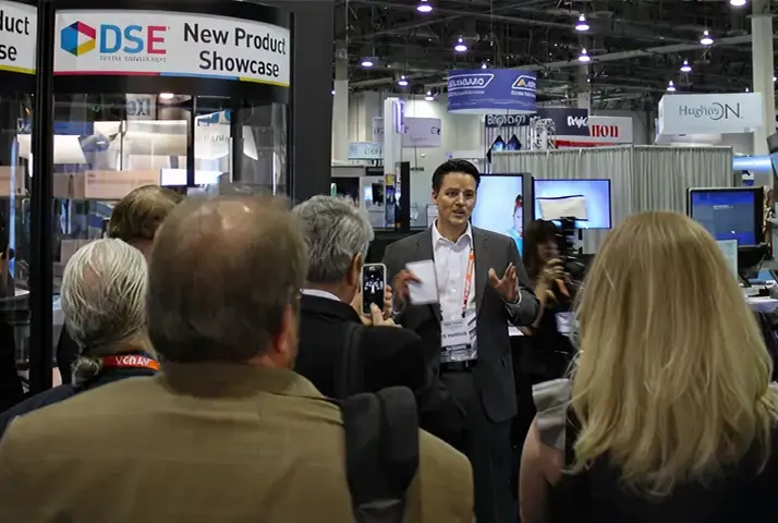 Wondersign founder Andy Reinhard speaking at a tradeshow