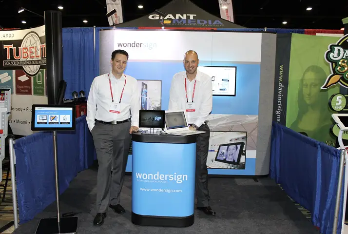Founders Andy Reinhard and Kaspar Fopp representing Wondersign at a trade show
