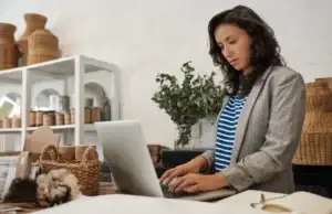 Image of a woman using an ecommerce website on a laptop